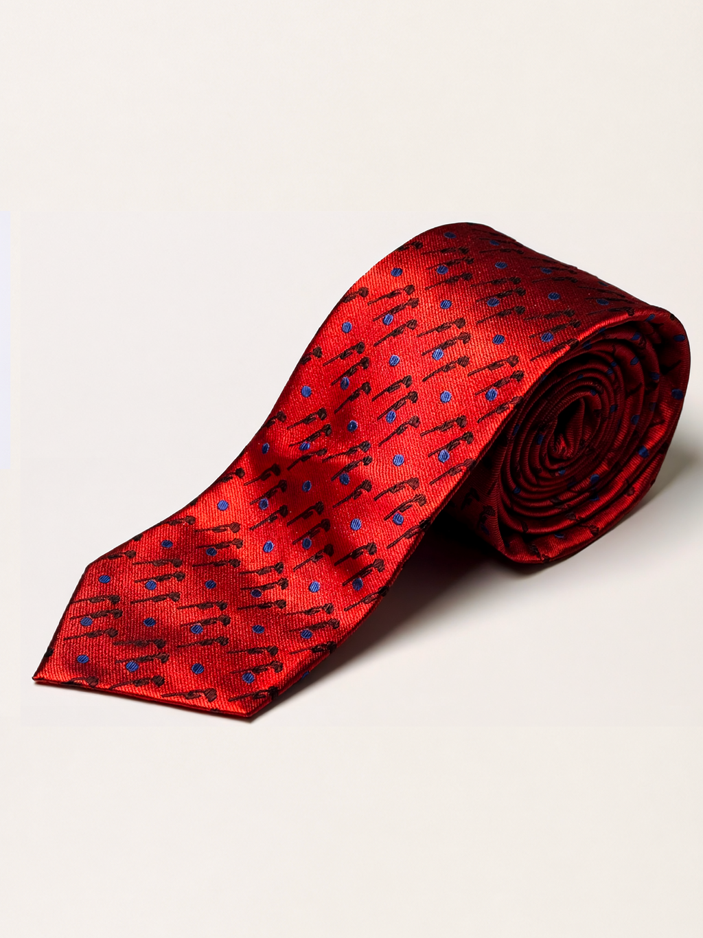 A red silk necktie with a repeating rose pattern